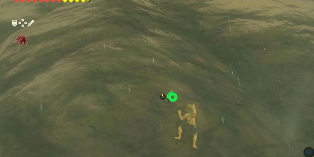 The Legend of Zelda Breath of the Wild screenshot of Link climbing in the rain