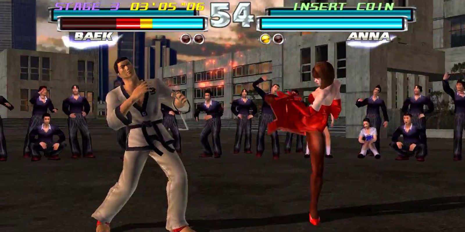 Tekken Tag Tournmanet- Anna kicks Baek in the head. 