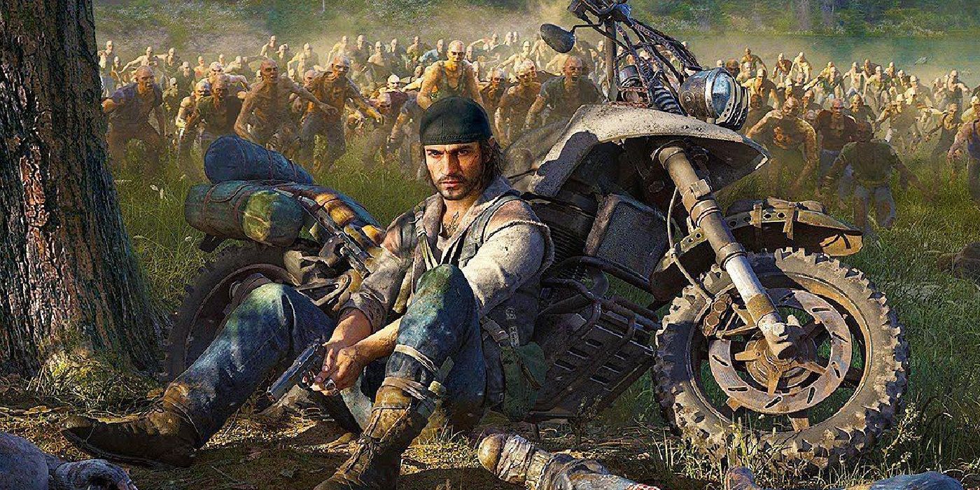 Deacon St. John sitting next to his motorcycle