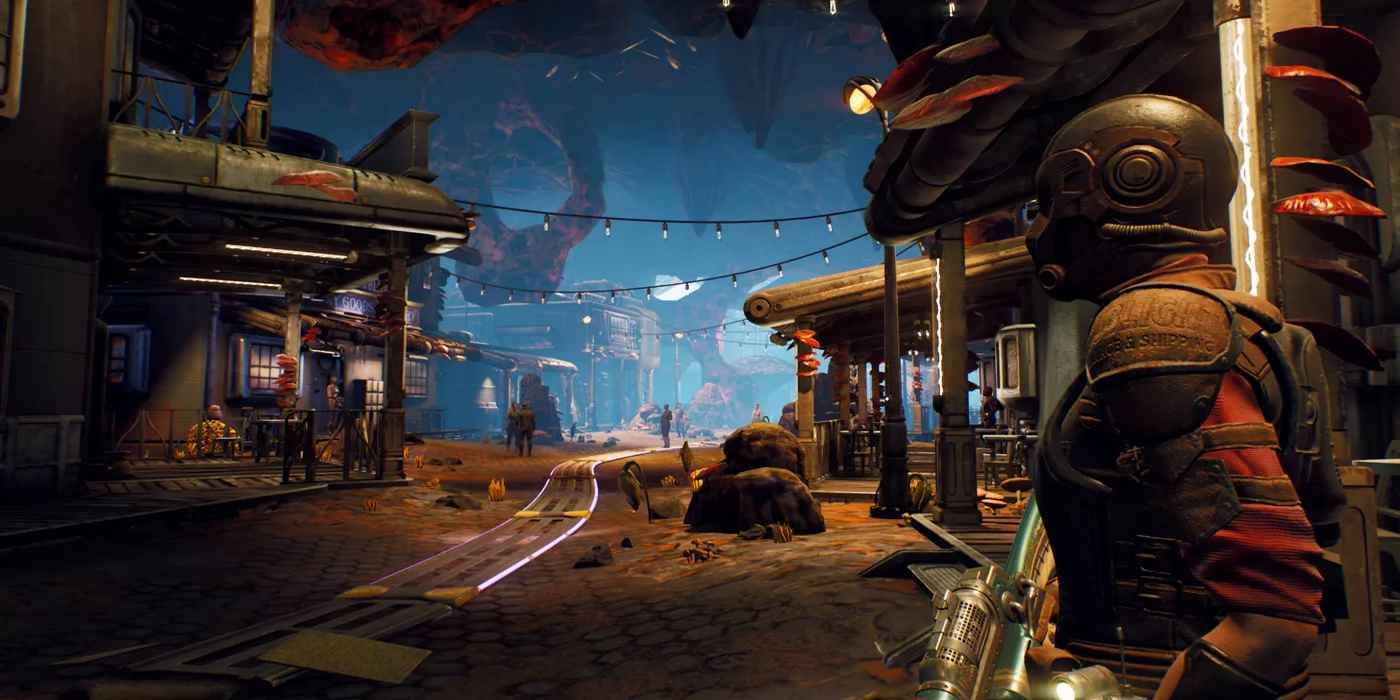 Outer Worlds character looks out onto a subterranean town