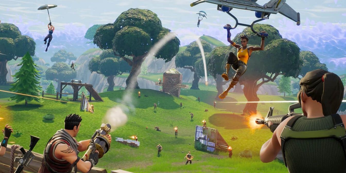 A range of players in various action poses in Fortnite