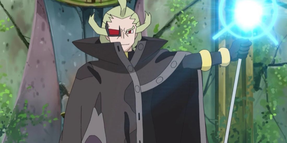 Ghetsis holding a staff