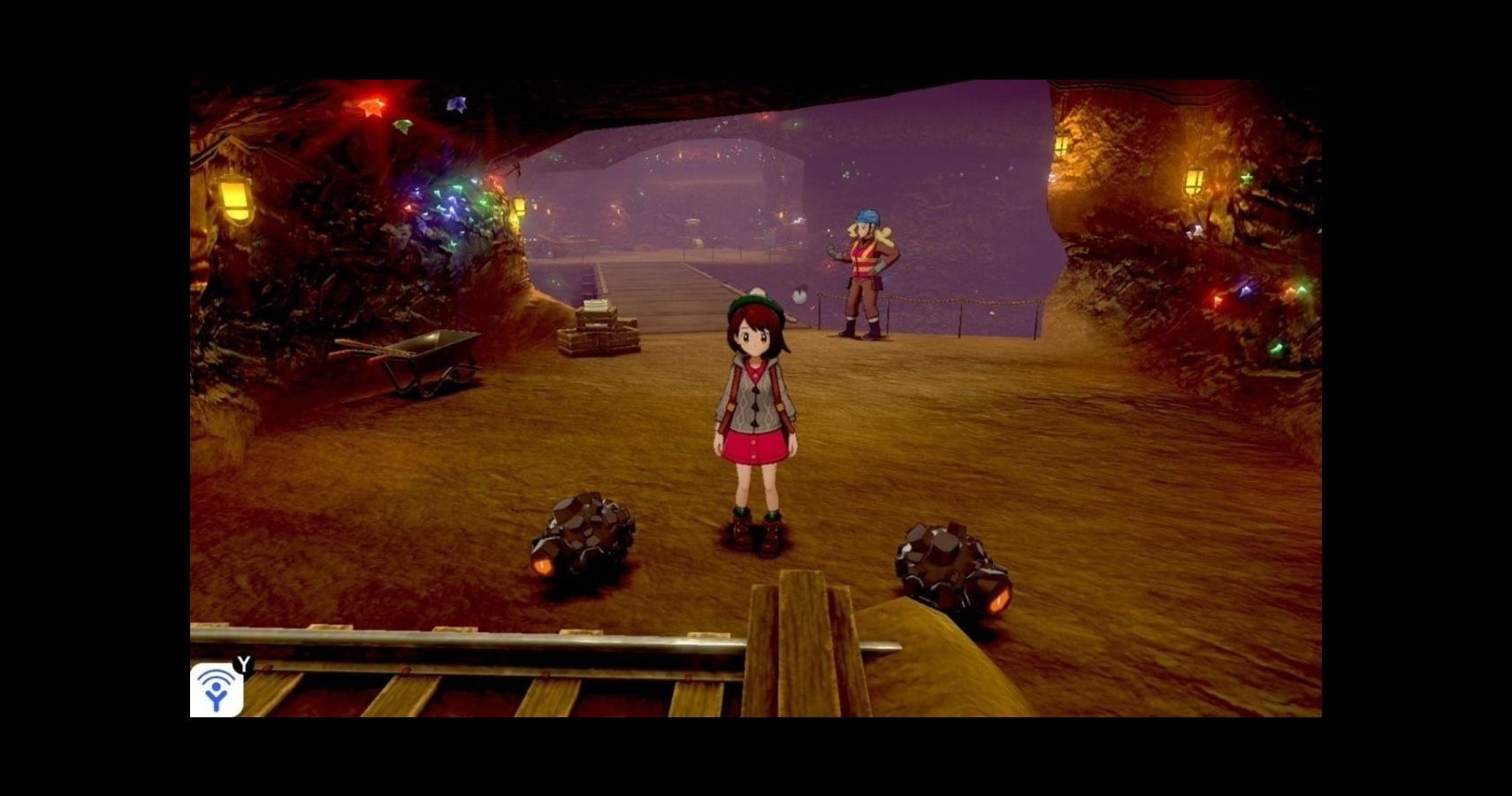 Pokemon main character sprite in the Galar mine with rolycolys.