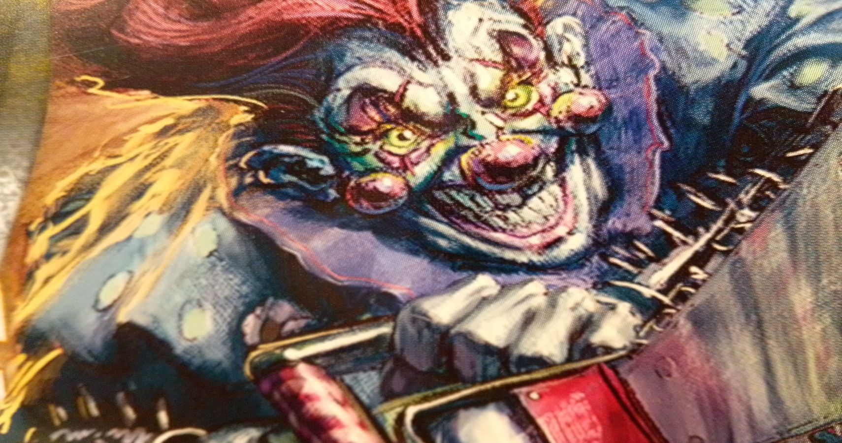 Buzzkill Clown revs his chainsaw in Dreamblade's third expansion.