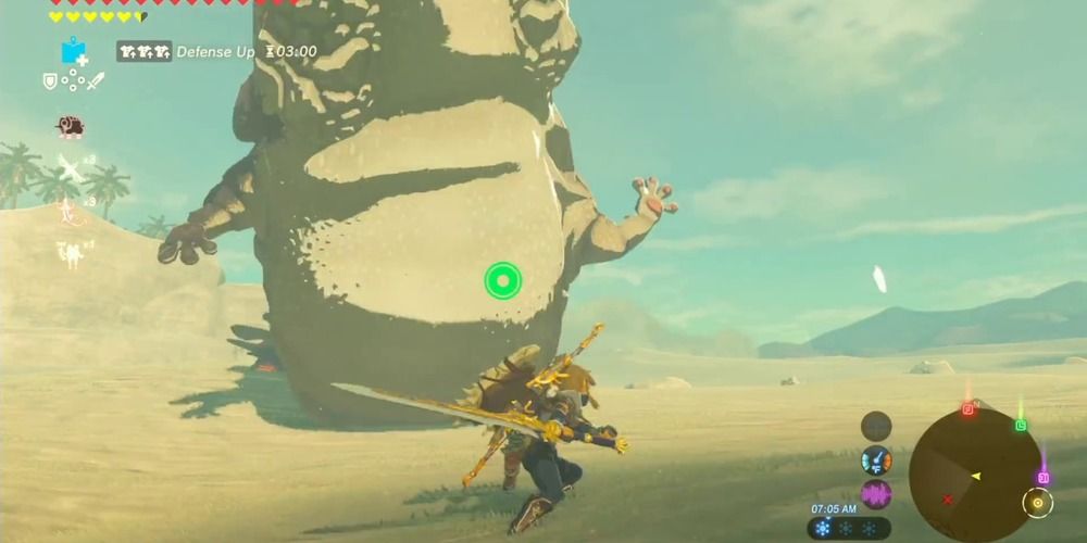 Link attacks the belly of Molduga in BotW