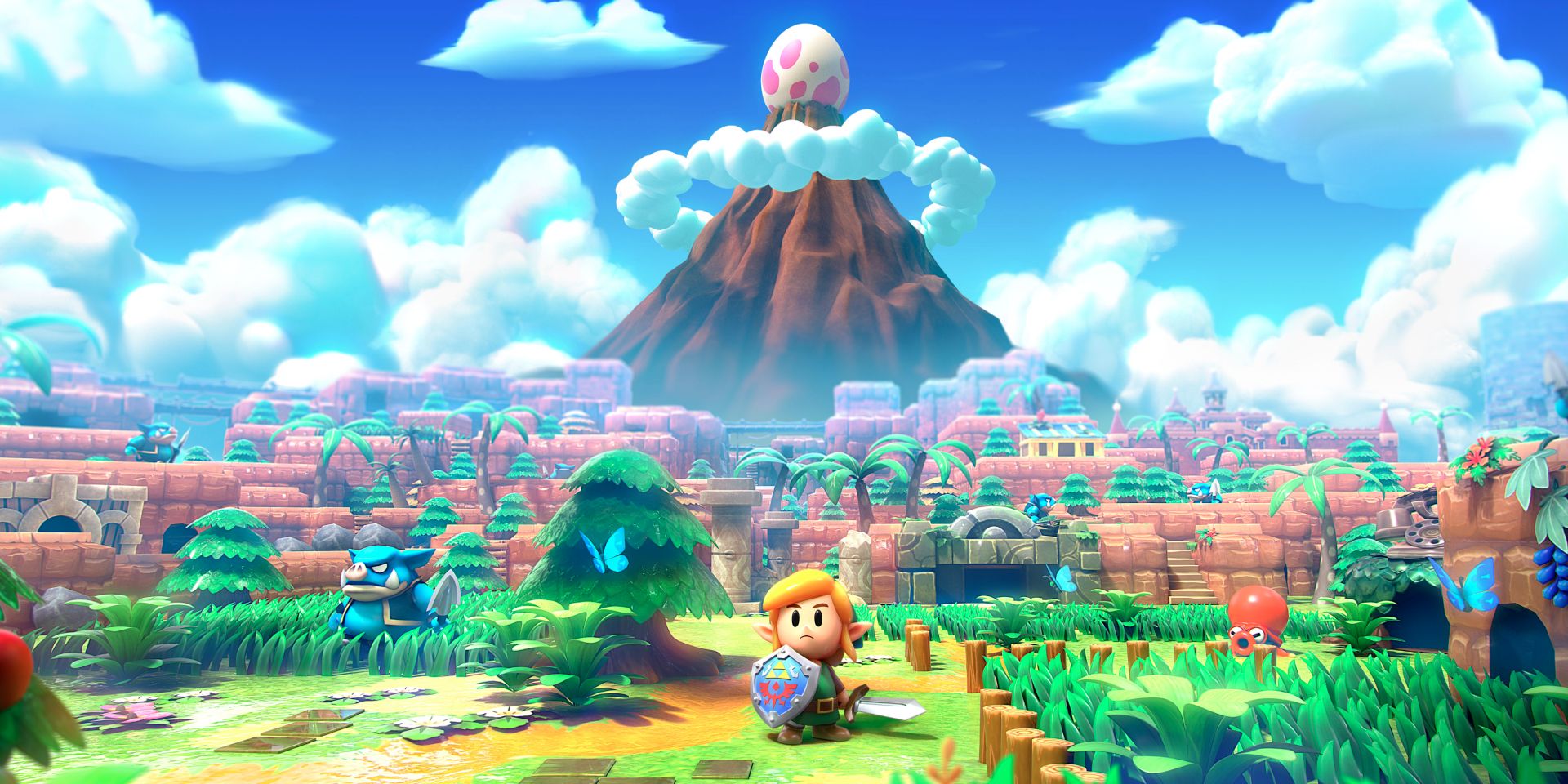 Link standing in front of a great mountain on Koholint island in Link's Awakening box art