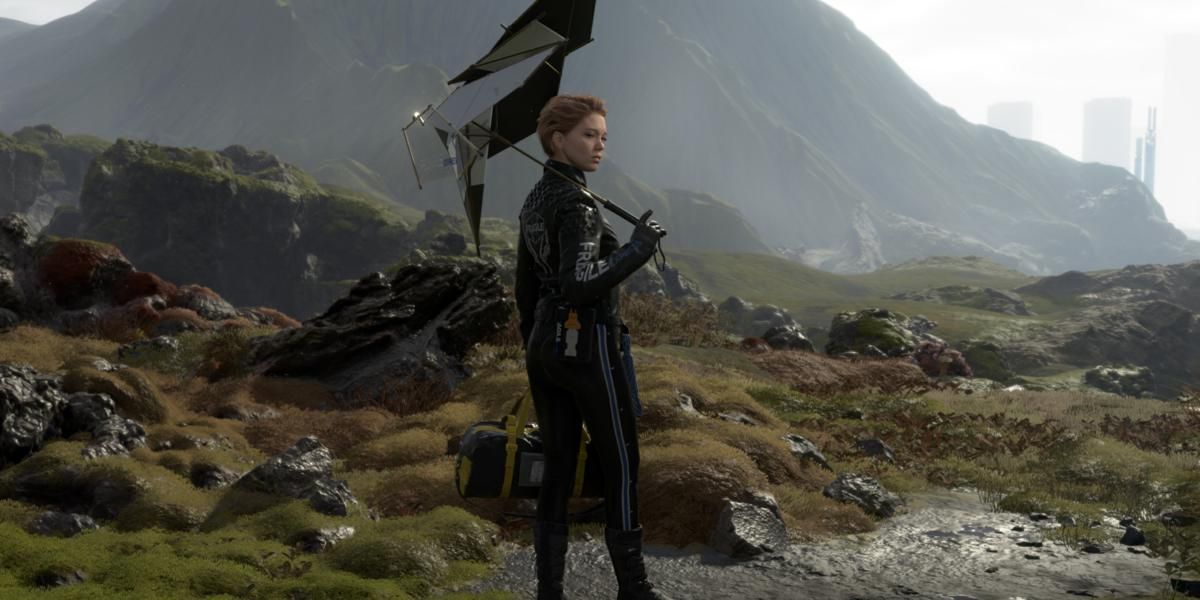 Fragile holding umbrella in Death Stranding