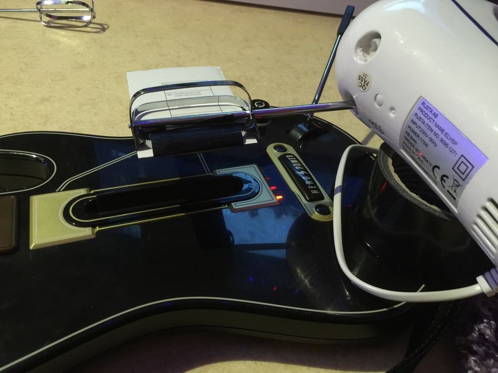 Electric Mixer Strumming A Guitar Hero Guitar