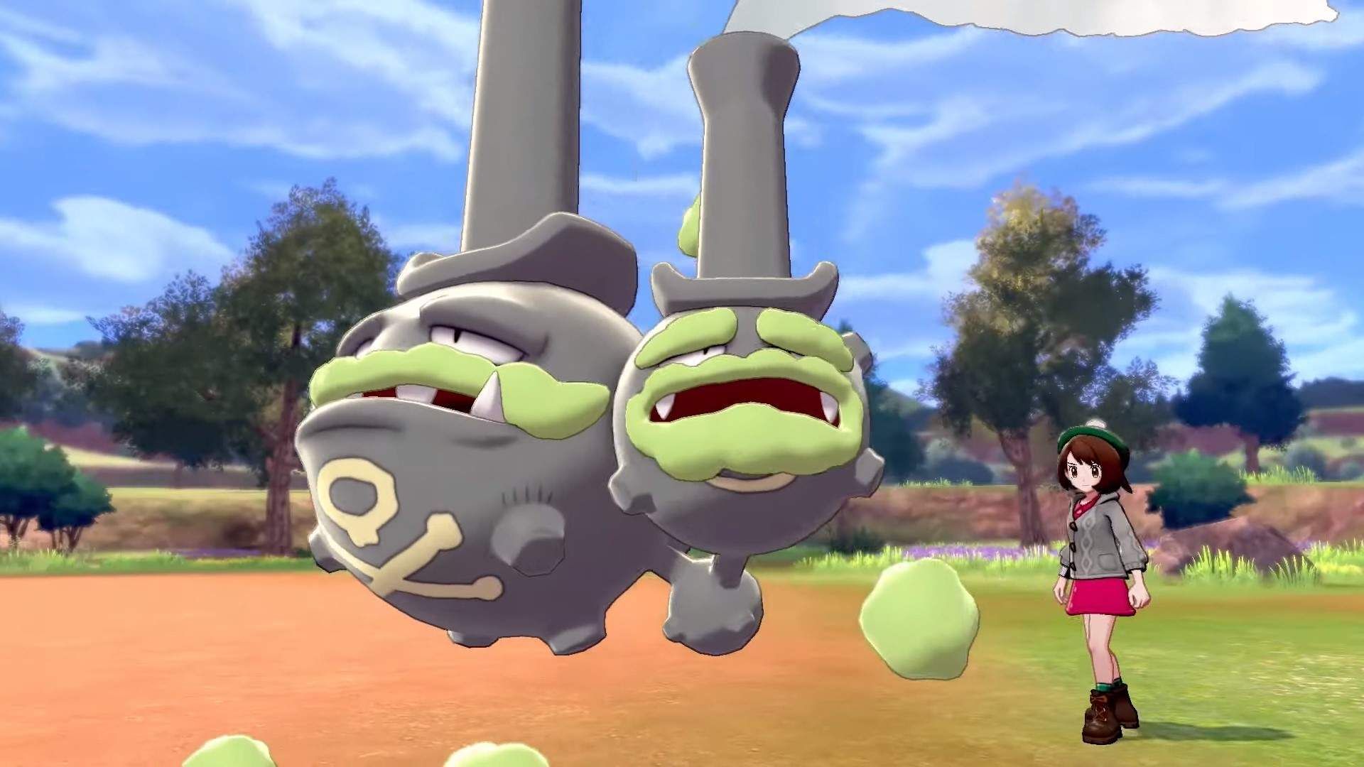 Gloria, the player character, sends out a Galarian Weezing in battle.