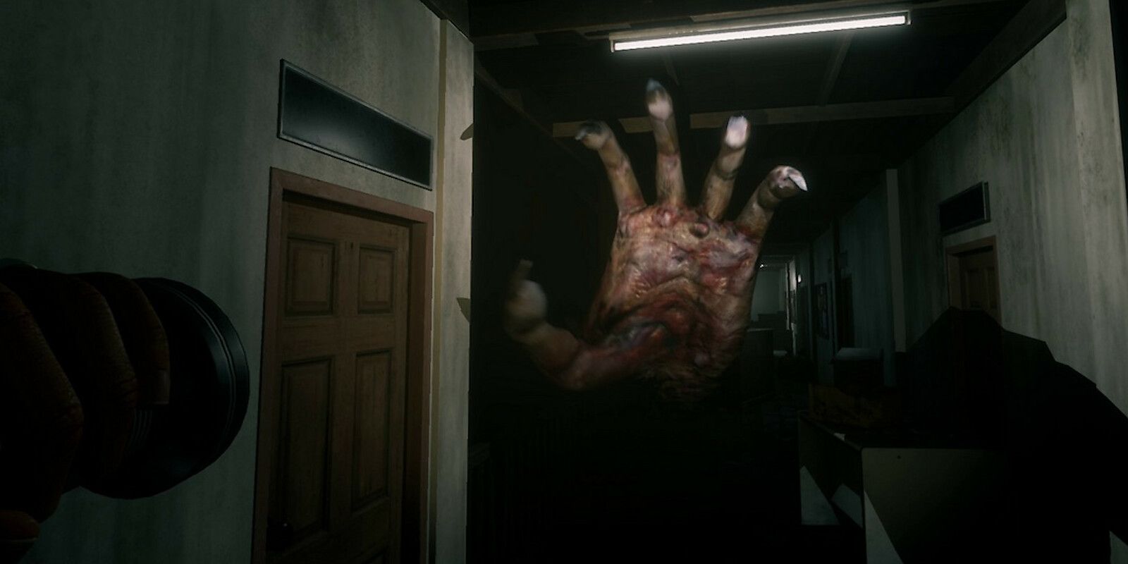 A hand reaching out in Home Sweet Home