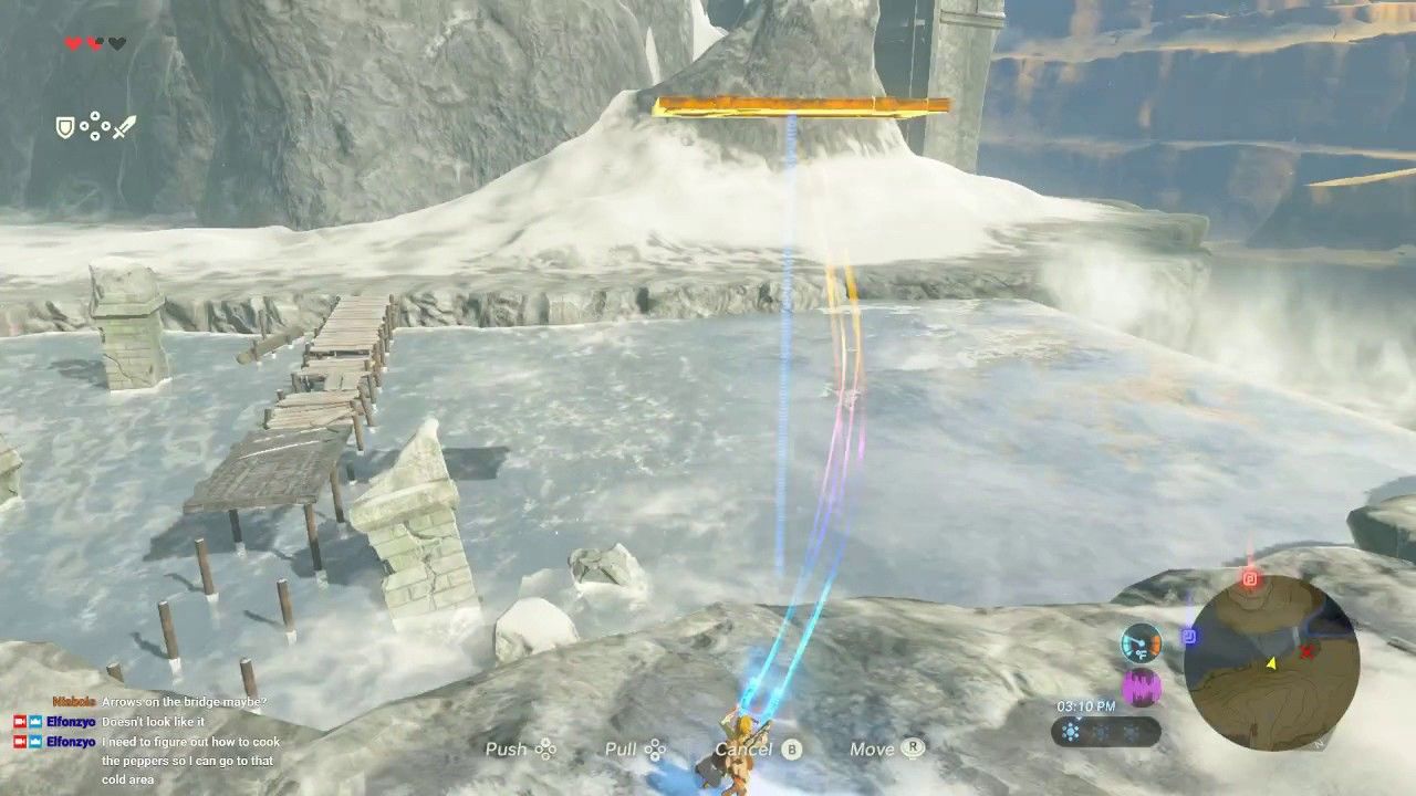 Link using Magnesis, one of his Sheikah Slate abilities.