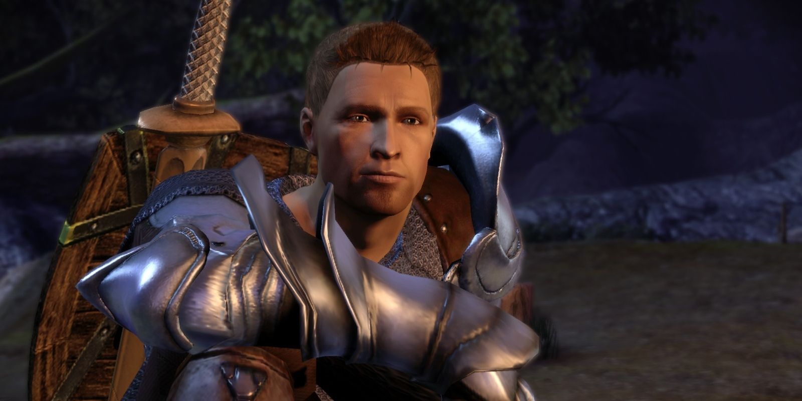 alistair sitting at camp