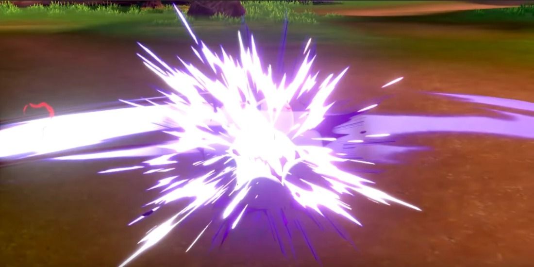 An unknown Pokémon is hit with an especially explosive Breaking Swipe in Pokémon Sword & Shield