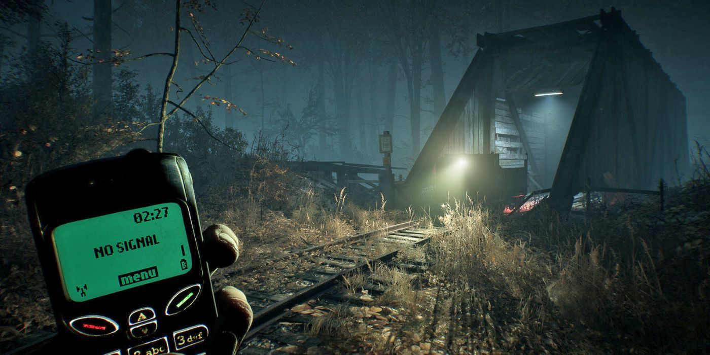 Blair Witch Holding Phone By The Bridge