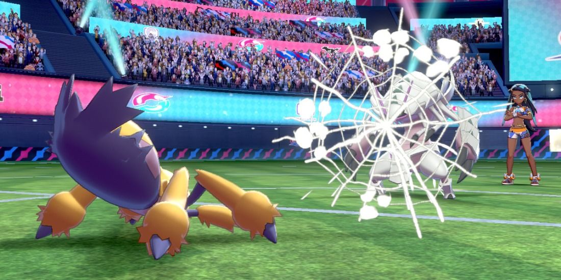 Galvantula uses Sticky Web against Nessa's Golisopod at Wyndon Stadium in Pokémon Sword & Shield