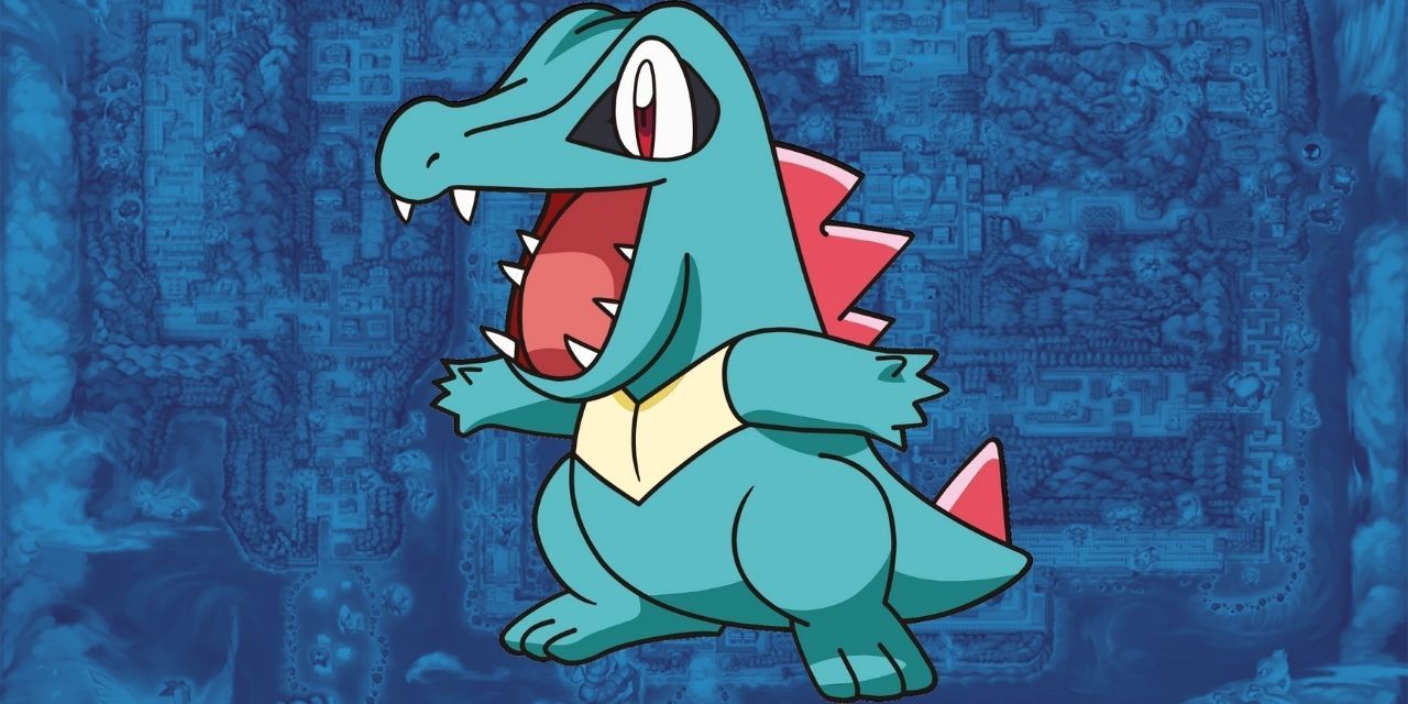 Totodile smiling against a blue background