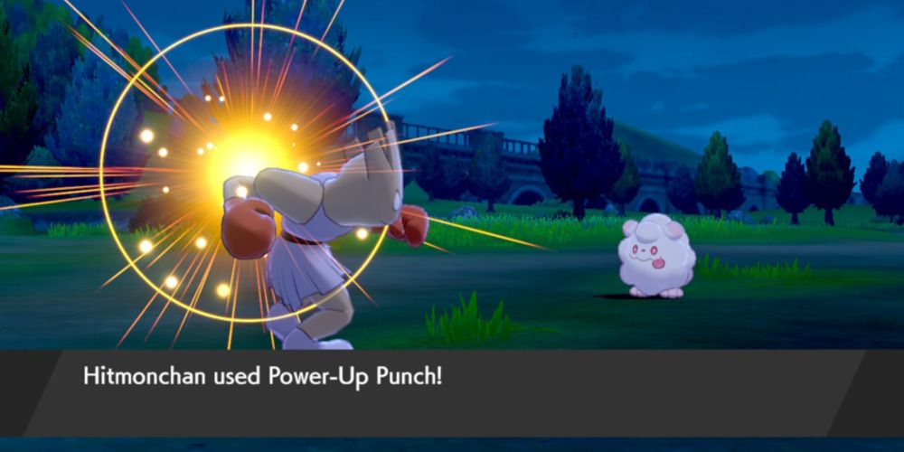 Hitmonchan using Power Up Punch against a wild Pokemon in Sword and Shield