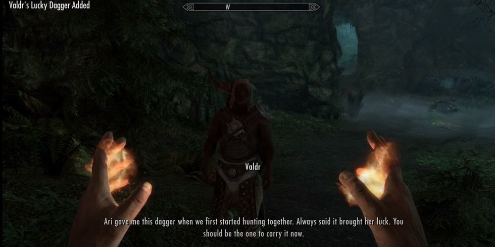 Valdr giving the player his dagger in Skyrim