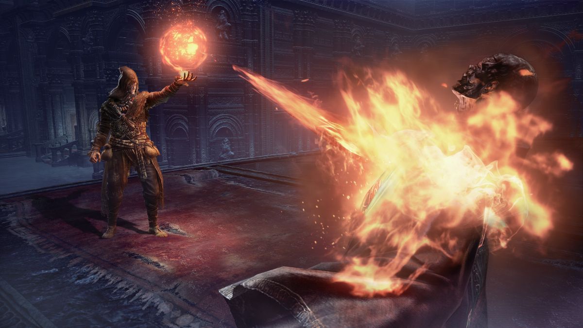 A player burning an enemy using a fire sphere.