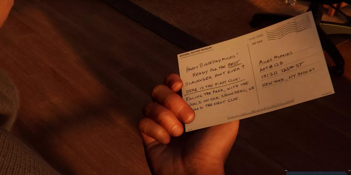 Miles holding a post card