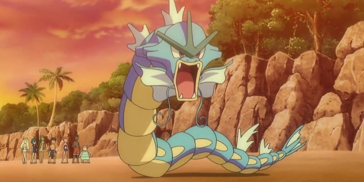 A Gyarados in the Pokemon anime, roaring on a tropical beach.