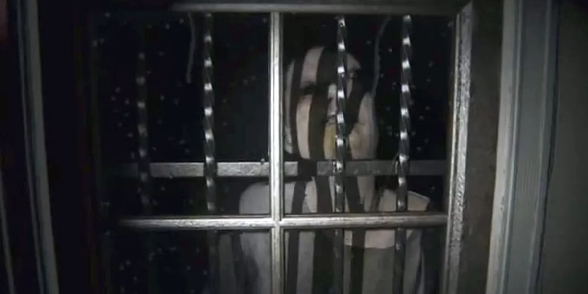 A creature outside of a window in Silent Hills