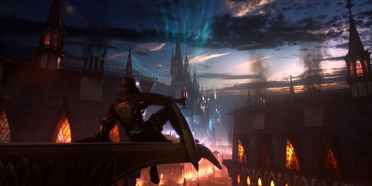 man sitting on roof with goblet and seeing city scape