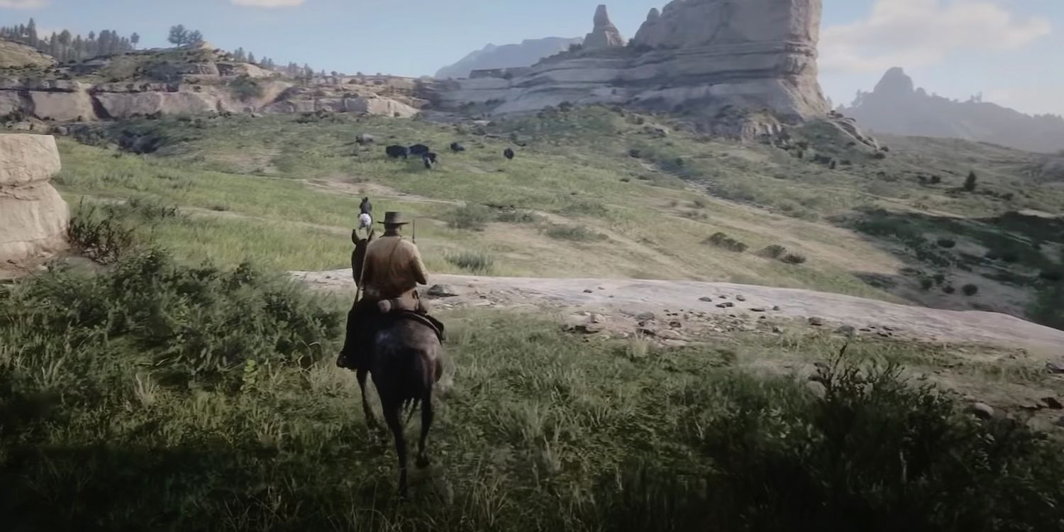 Men Riding Horses Across Picturesque Backdrop