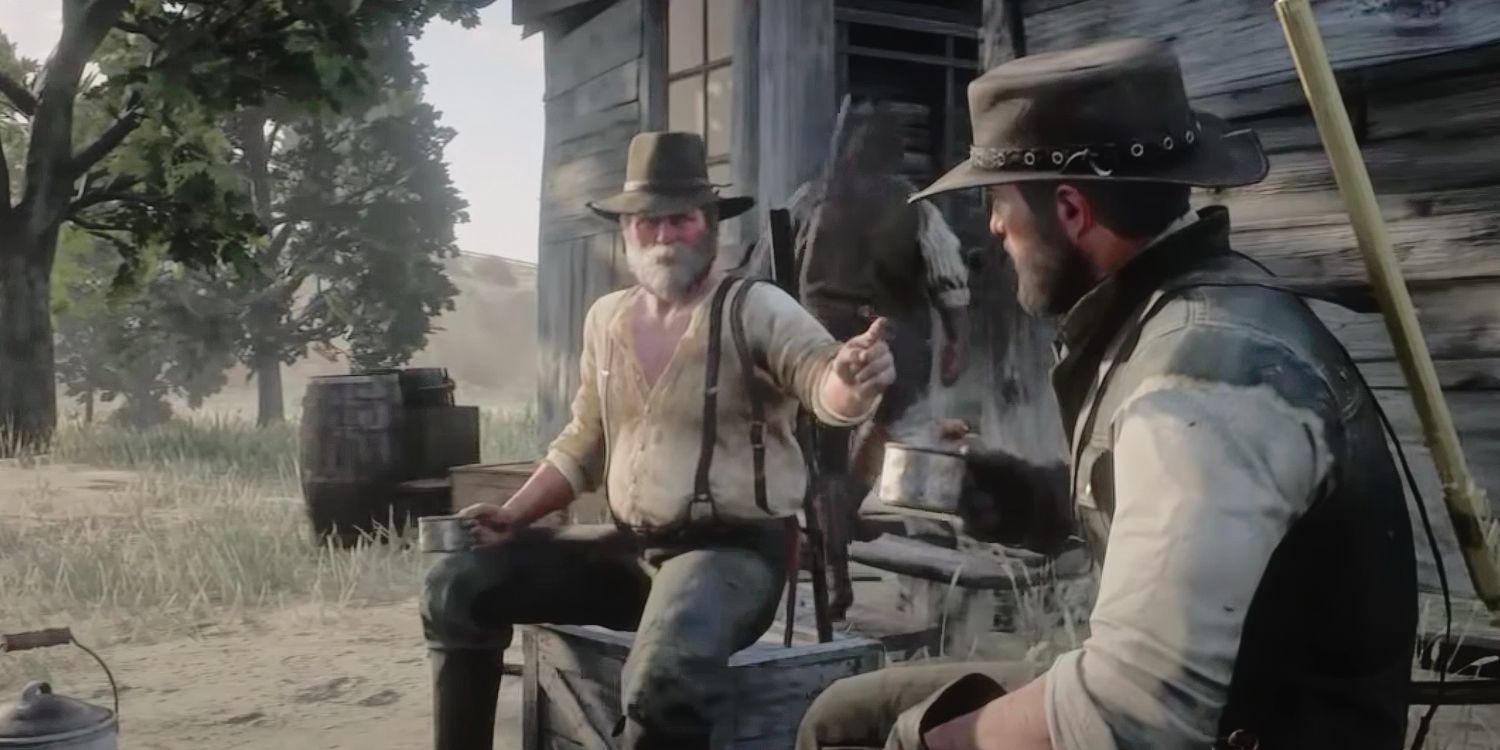 Men Sat Talking Around Camp