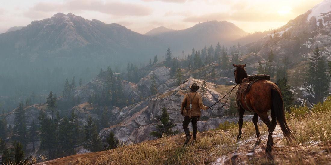 Looking at a sunset in Red Dead Redemption 2 with a horse