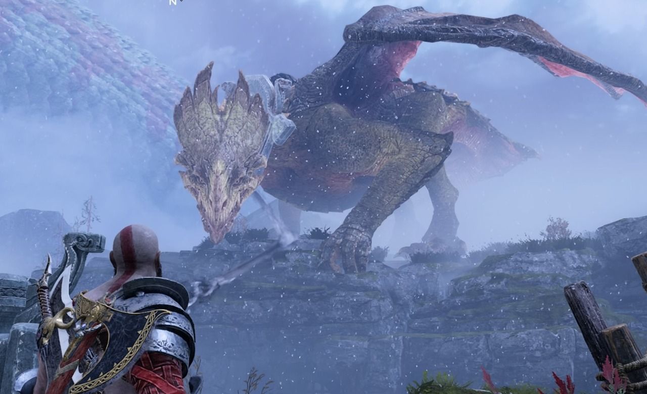 Kratos facing Reginn the dragon