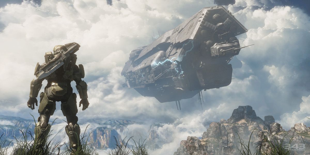 A promo shot of Master Chief standing on a cliff