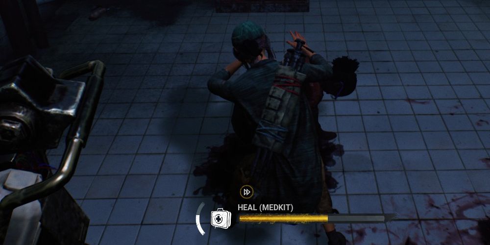 Healing Survivor with a medkit in Dead by Daylight