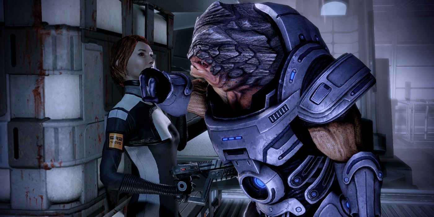 Grunt pushing Shepard against a wall in Mass Effect