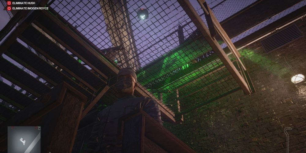 Hitman 3 Patrolling Security Droid Flying Over A Back Entrance