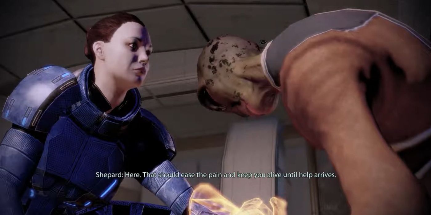 Mass Effect 2 Screenshot Shepard Assisting Injured Salarian