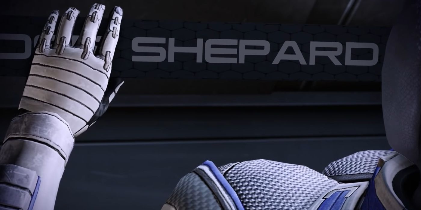 Mass Effect 3 Screenshot Of Liara Holding Commander Shepard's Name Plate