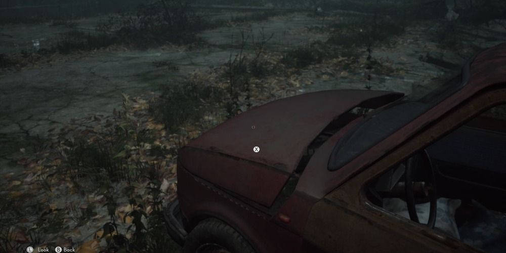 Abandoned car outside Niwa Hotel in The Medium
