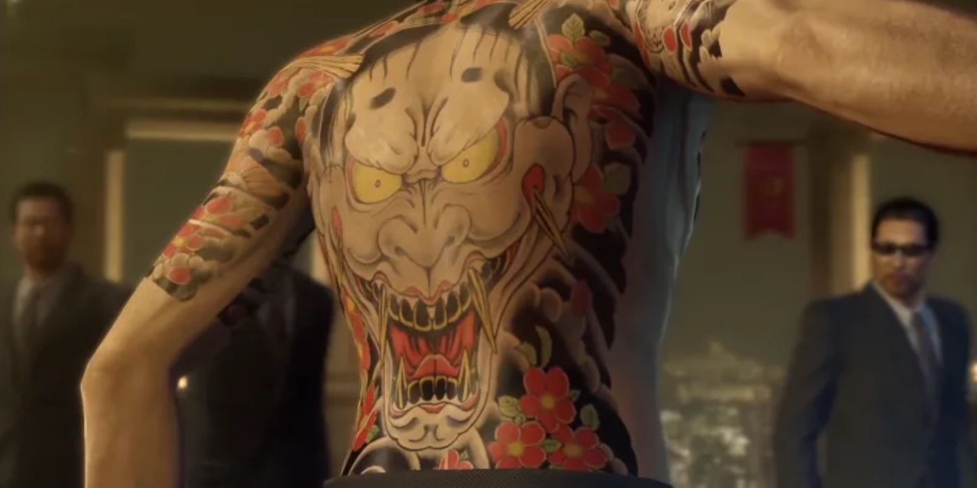 a large back tattoo on majima in yakuza