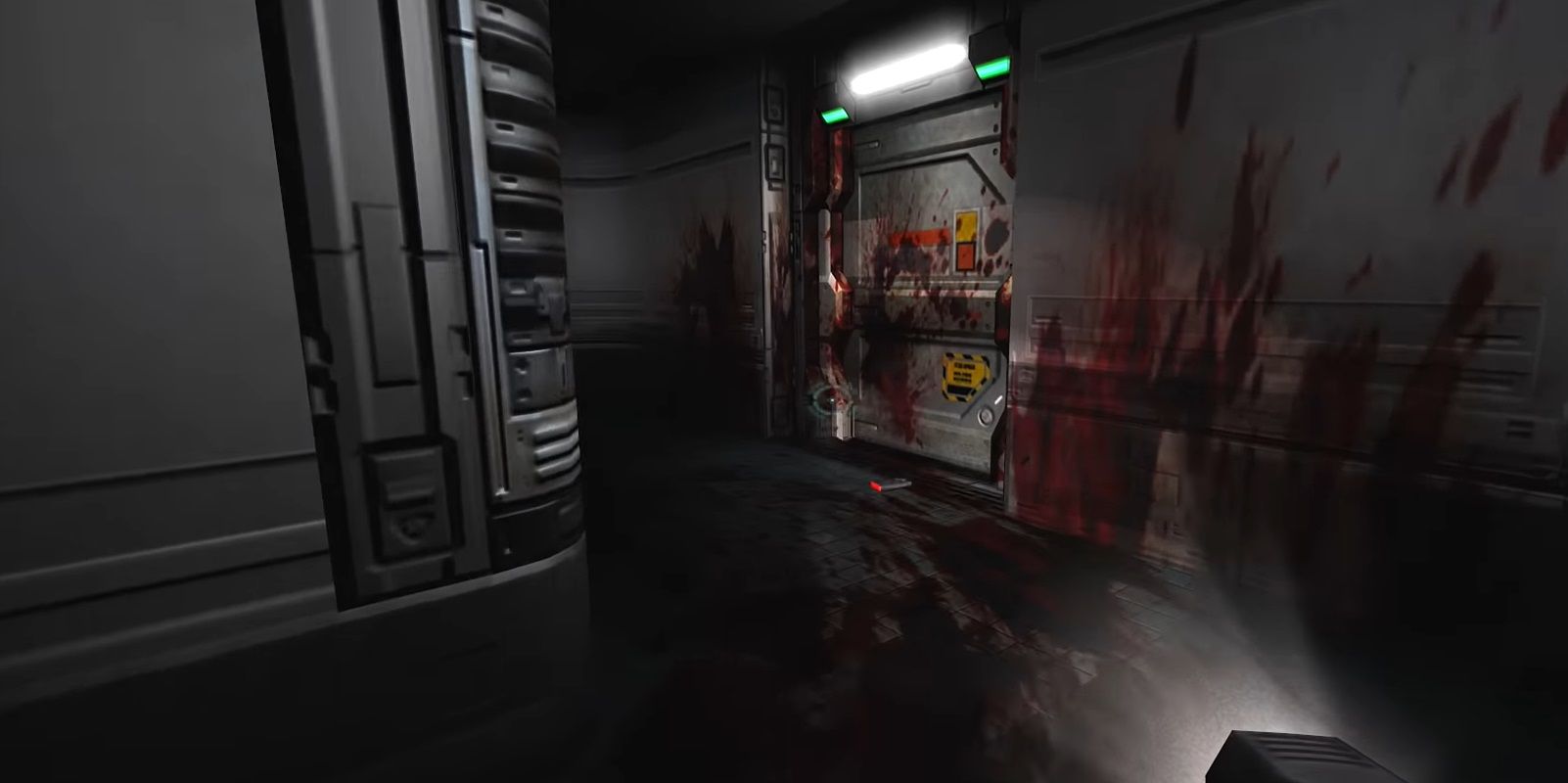 Doom 3: An empty room with blood on the ground from someone who was most likely dragged
