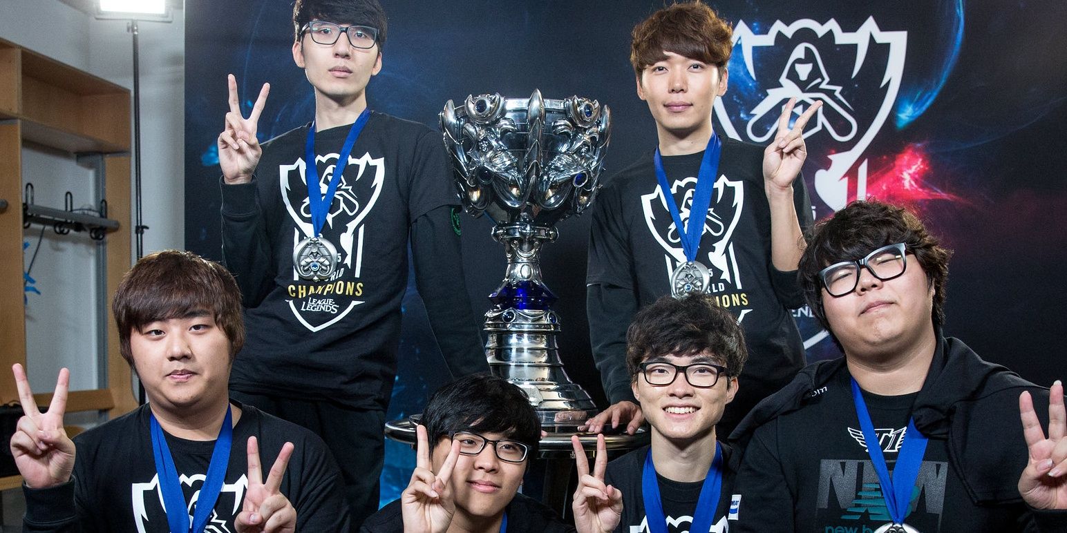 SKT T1 Poses For The Camera Holding Up Peace Signs Smiling
