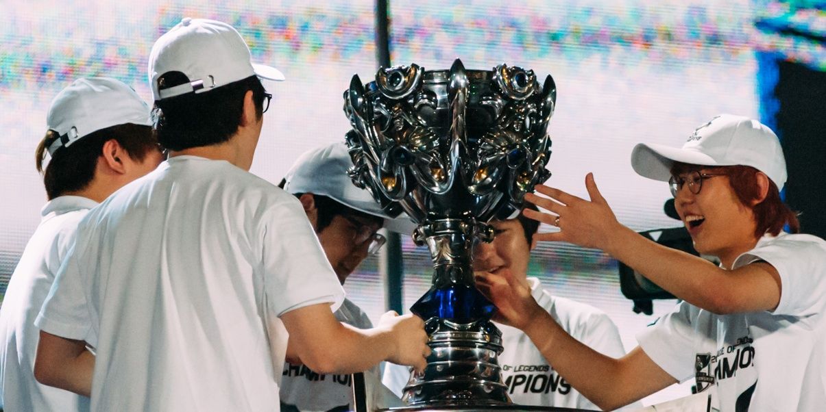 Samsung White Approaching The Summoners Cup After Winning In The Finals imp Smiling Reaching Out For The Trophy