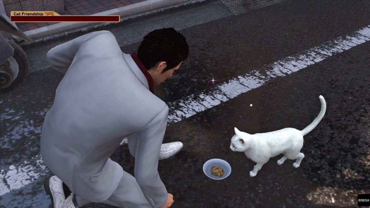 Yakuza 6 Kiryu befriending a cat