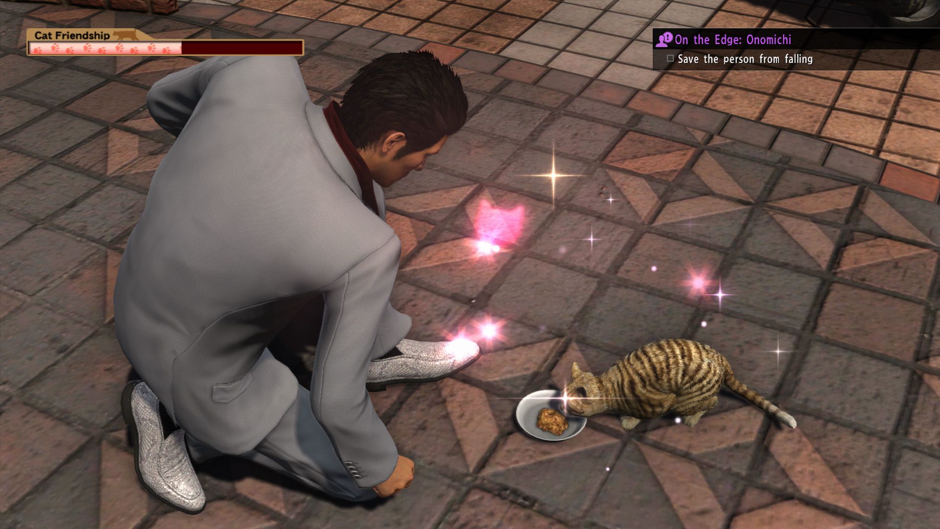 Yakuza 6 Kiryu befriending a tiger-striped cat