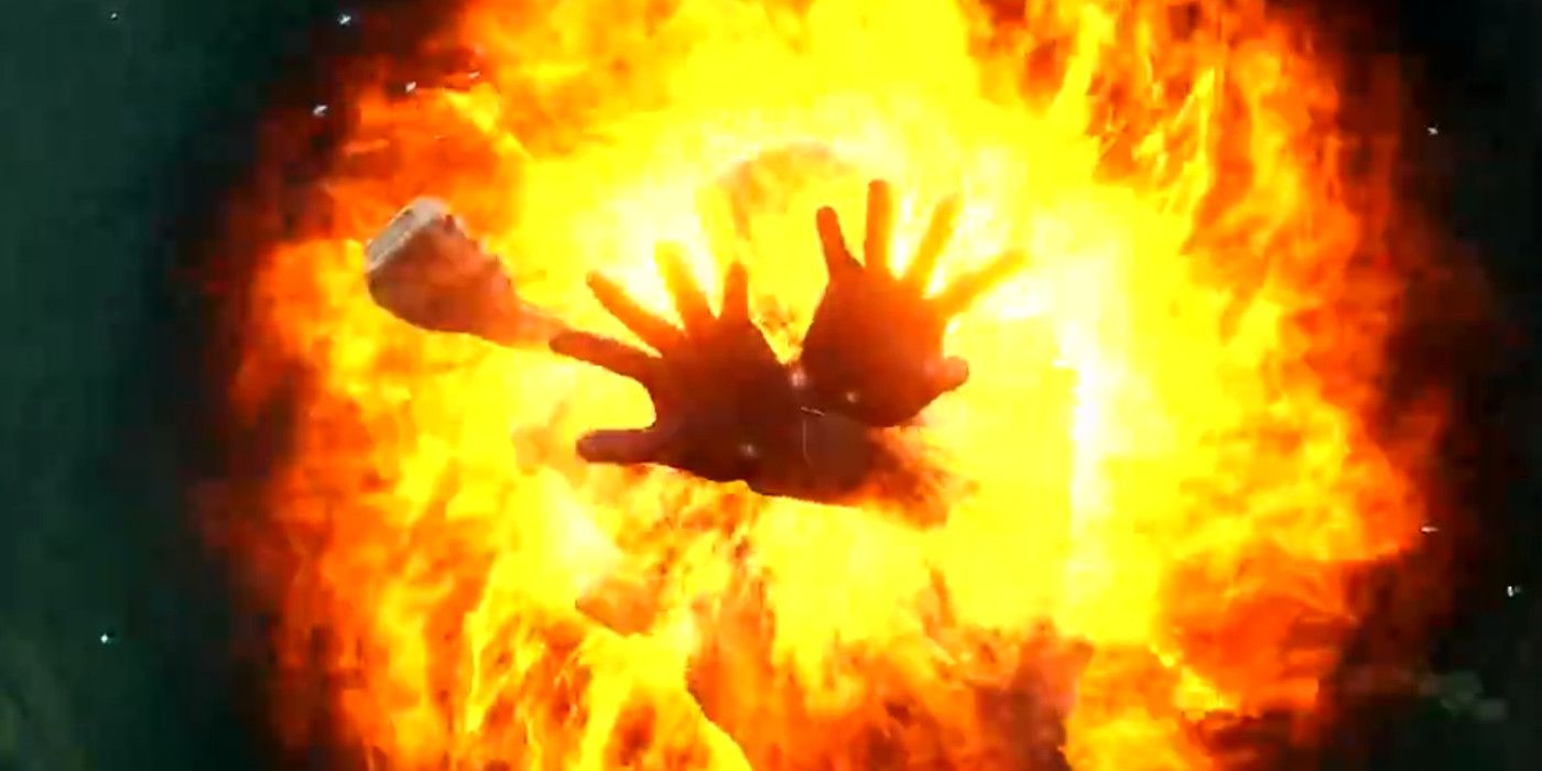 a fire witch build firing the faser beam skill. Both hands are crossed over each other as a circular inferno surrounds them