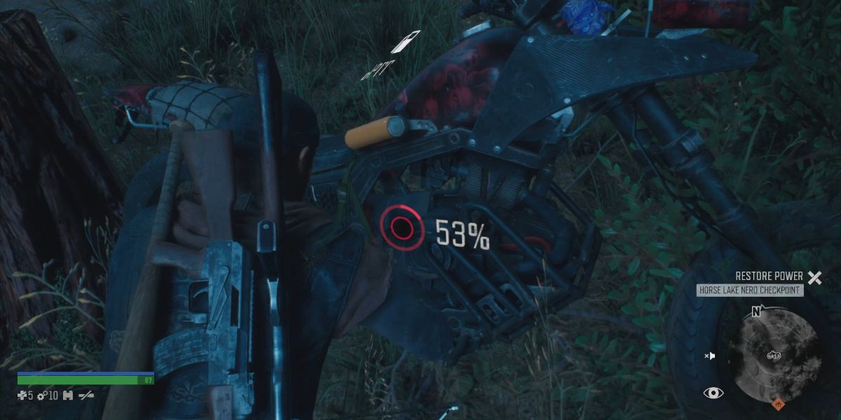 Deacon repairing his bike using scrap.
