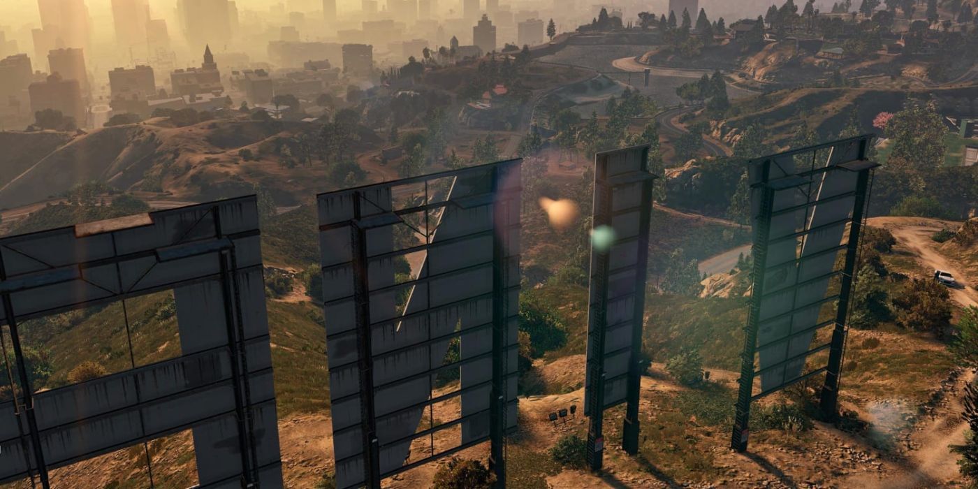 The back of the Vinewood sign in GTA V that shows off a forested section of Los Santos