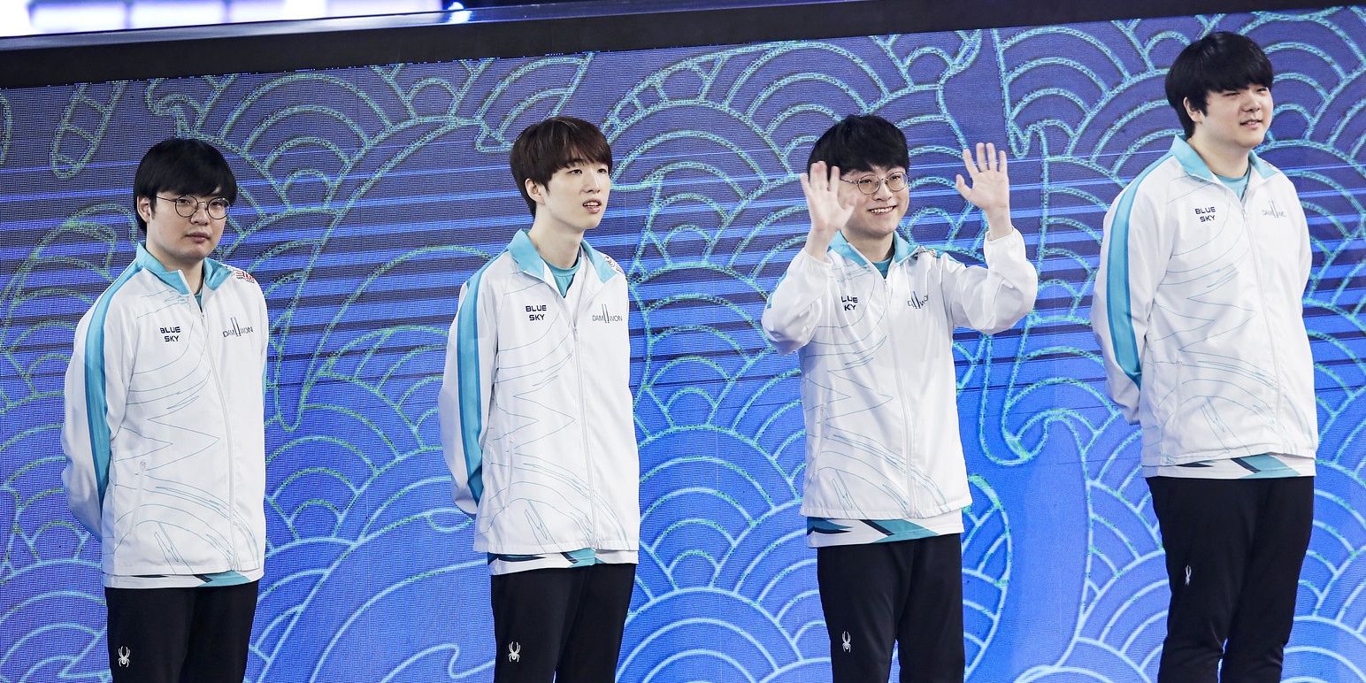 League of Legends Damwon gaming on stage before competing in the finals waving at fans