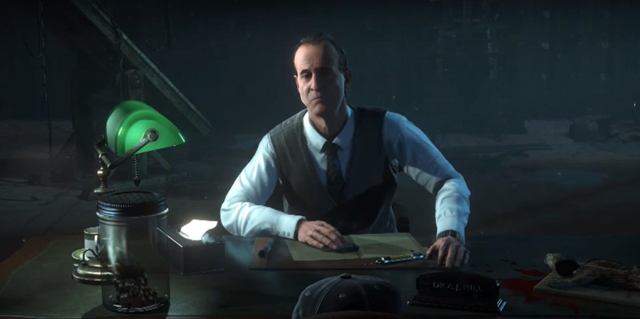 Dr Hill at desk