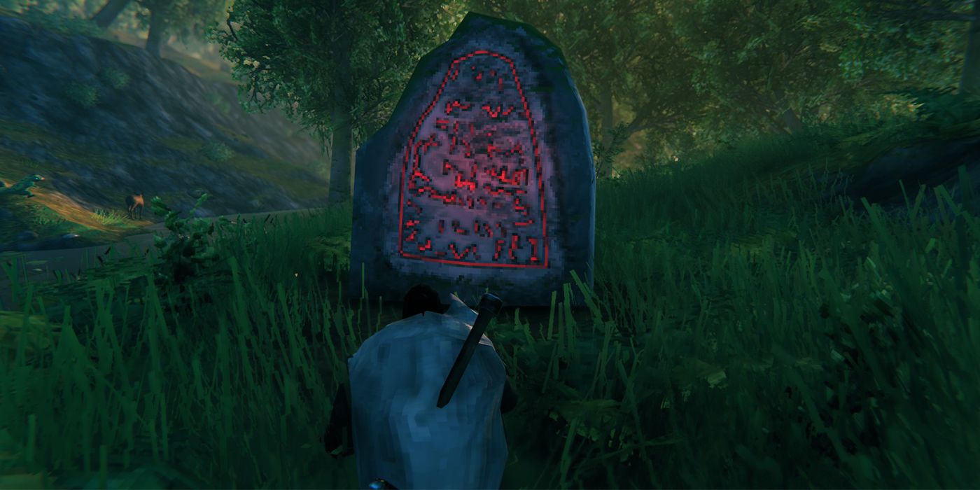 A Character Reading A Runestone In Valheim
